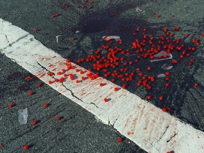 USA. New York City, NY. 2014. Cherries spilled on crosswalk. Christopher Anderson Magnum Manifesto 