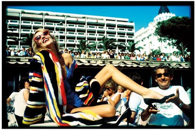 Jerry Hall and Helmut Newton, Cannes by David Bailey, 1983 © David Bailey.Bailey's Stardust at the National Portrait Gallery, London.