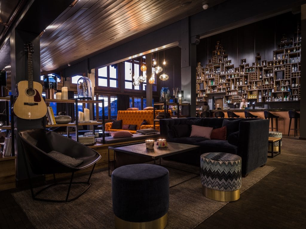 Huus Hotel Gstaad Saanen Switzerland bar lobby lounge